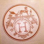 Hermès logo in mosaic on the floor of the Ephemeral boutique inside Franck&Fils - Paris